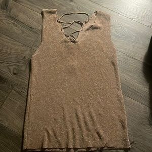 Gold short sleeve shirt.